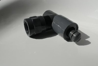 The basic valve body, vent end, open position. The valve is reset by hand.