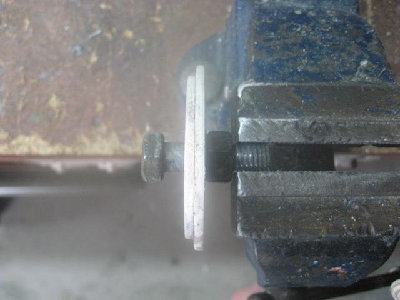 2 - The two disks, smaller one to seal against the inside of the pipe, larger one to seal inside the fitting.