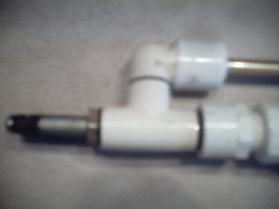 a close up of the new and improved setup with the 1/8 in. nipple striker (no not a nipple striker) lol