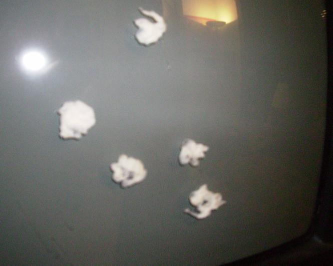 damage pics on the t.v. lol  using spit balls