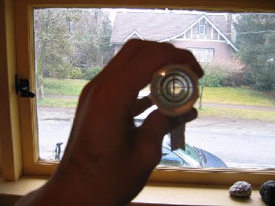 the crosshairs through the objective lens