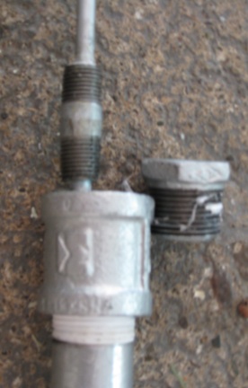 This is the front. I cannot thread the nipple on the inside of the bushing because the threads on that side of the nipple are damaged.