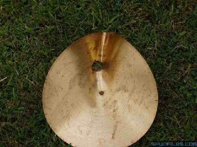 Here is an old cymbal after an encounter with a broomstick.