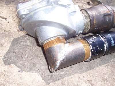 It's just solder.<br />Not very clean, but with some grinding or a real weld it could look nice.